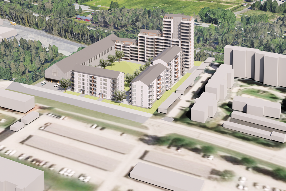 3D-visualisering av ett planerat bostadsområde med flera flerbostadshus i varierande höjd, placerade kring en grön innergård. Två högre byggnader reser sig i bakgrunden medan lägre hus omgärdar området. Omgivningen består av grönområden, befintliga byggnader och vägar. Perspektivet är snett uppifrån, vilket ger en tydlig överblick över området och dess planerade struktur.