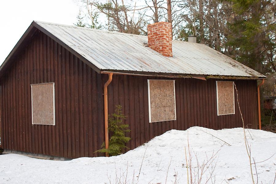 Fotografi på stuga 43 som revs 2021